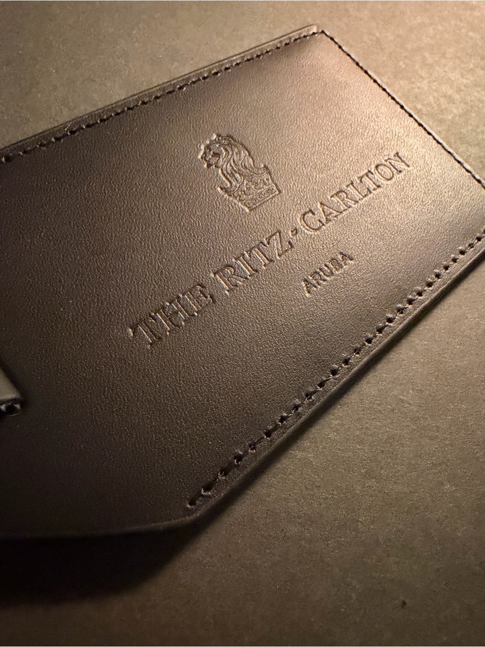 The Ritz-Carlton Embossed Leather Luggage Tag - black